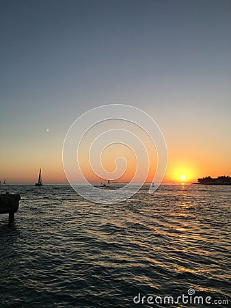 Sunset Sail Stock Photo