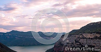 Scenic landscape with pink sunset in Sau Lake, Catalonia, Spain. Stock Photo