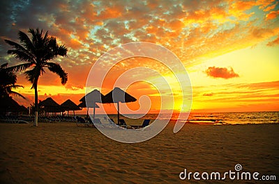 Sunset Scene at Tropical Beach Resort Stock Photo