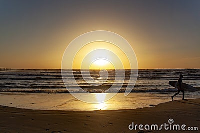 Sunset on the sea coast is ideal for evening surfing Editorial Stock Photo