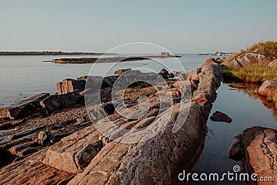 Sunset on the see stone waterbank Stock Photo