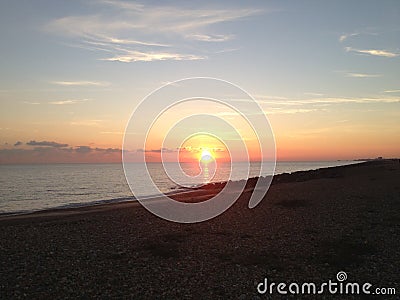 Sunset on Shoreham beach East Sussex Stock Photo