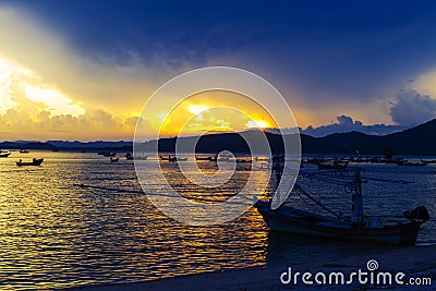 Sunset with silhouette Baan Koh Teab beach Stock Photo