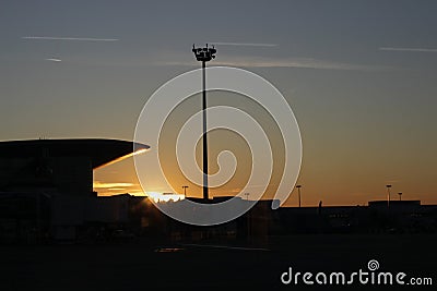 Sunset Silhouette: Bucarest Airport& x27;s Evening Glow Editorial Stock Photo