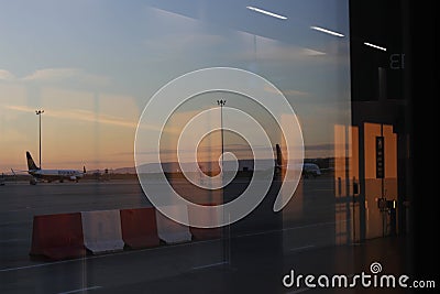 Sunset Silhouette: Bucarest Airport& x27;s Evening Glow Editorial Stock Photo