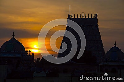 Sunset with silhouette of Sarangapani Temple, Kumbakonam, Tamil Nadu, India Stock Photo