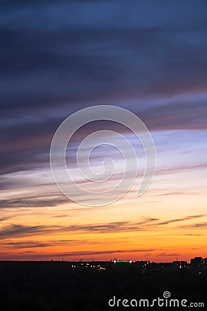 Sunset sky blue-orange colors with dramatic clouds Stock Photo