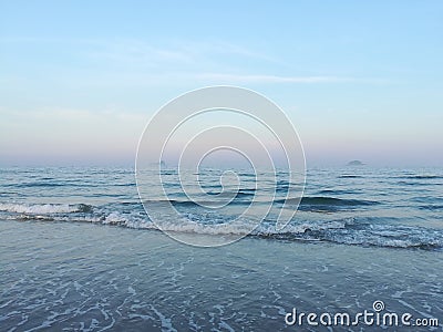 Sunset Sky in front of Seaside Beautiful beaches and small waves. Thailand Beach Stock Photo