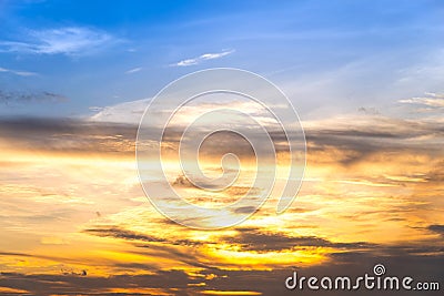 sunset sky with rays of light shining clouds and sky background Stock Photo