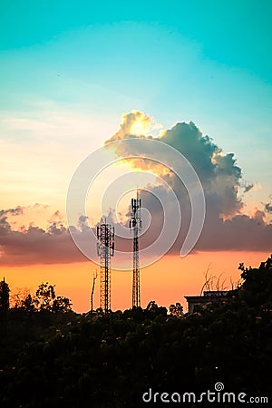 Sunset sky with silhouette antenna Stock Photo