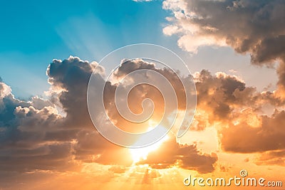 Sunset sky - sun shining through clouds scenic sky Stock Photo