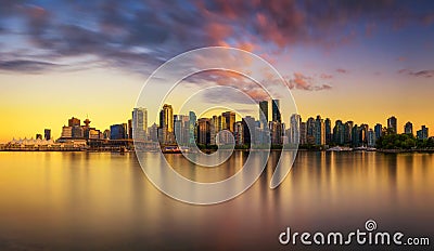 Sunset skyline of Vancouver downtown from Stanley Park Stock Photo