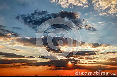 Sunset with sun rays Stock Photo