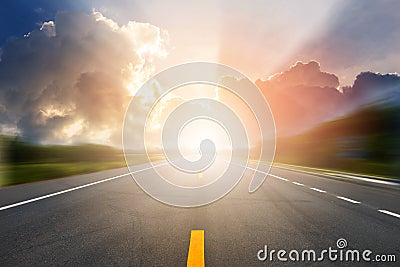 Sunset or sunrise light above asphalt road Stock Photo