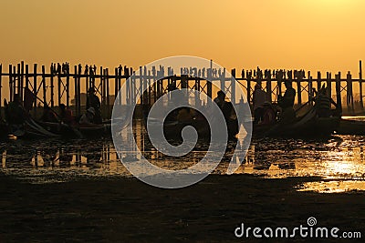 Sunset or sunrise in Mandalay U bein traditional bridge Myanmar Burma Birmanie Editorial Stock Photo