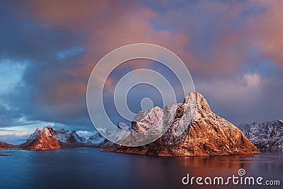 Sunset or sunrise panoramic view on stunning mountains in Lofoten islands, Norway, Mountain coast landscape, Arctic circle. Stock Photo