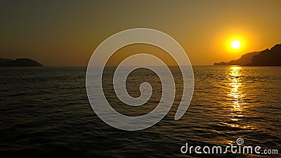 Sunset or sunrise with sea calm and islan lost Stock Photo