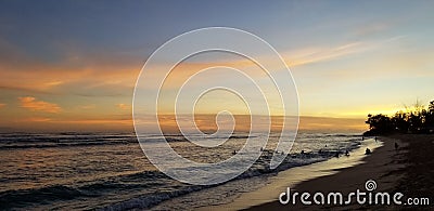 Sunset Surf Session in Ohau Hawaii Stock Photo