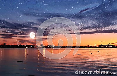 Sunset Tallinn . Old town Panorama starry night and moon on sky,summer night seascape city light reflexion on water in harbor ,B Stock Photo