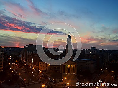 Sunset in the traffic circle evening bursts of lights in the ci Stock Photo