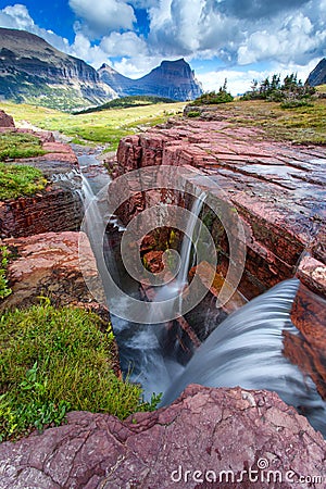 Sunset at Triple Falls in Glacier National Park, Montana, USA Stock Photo