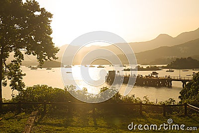 a sunset at TSO Wo Hang Pier hong kong Editorial Stock Photo