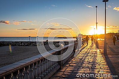 Sunset on vacation in the mediterranean. Golden hour by the sea. Sitges, Spain Stock Photo