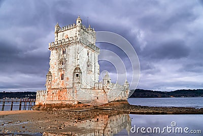 Sunset view of Belem Tower on a cloudy autumn evening, Lisbon, P Stock Photo