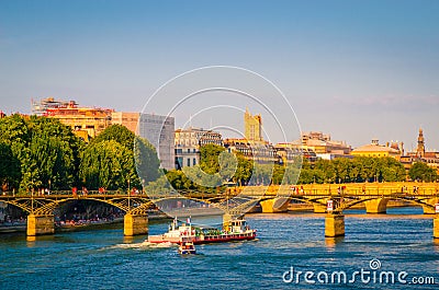 Sunset view on bridge Pont des Arts and buildings on the Seine river in Paris, France Stock Photo