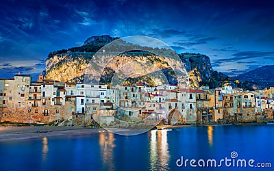 Sunset view of beautiful Cefalu, small resort town on Tyrrhenian coast of Sicily, Italy Stock Photo