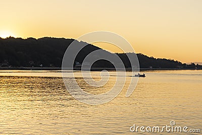 Sunset view of Danube River passing through a town of Golubac, Serbia Editorial Stock Photo