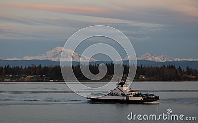 Sunset View of a Ferry Boat Crossing Hale Pass to Lummi Island. Stock Photo