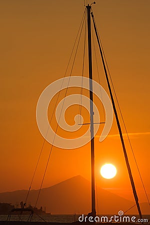 Sunset view framed from inside the mast of a sailing boat. Stock Photo