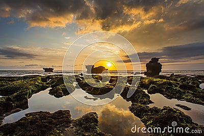 Sunset view in Mengening Beach Bali Indonesia Stock Photo