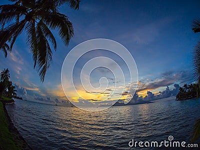 Sunset View of Moorea Island from Intercontinental Resort and Spa Hotel in Papeete, Tahiti, French Polynesia Stock Photo