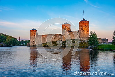 Sunset view of Olavinlinna castle in Savonlinna, Finland Editorial Stock Photo