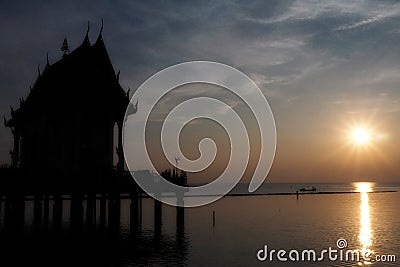 Sunset view on the river near Thai temple Stock Photo