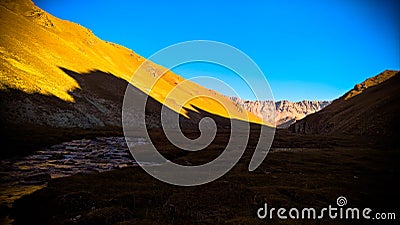 Sunset view to Tash-Rabat river and valley in Naryn province, Kyrgyzstan Stock Photo