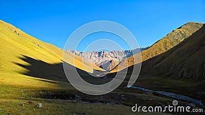 Sunset view to Tash-Rabat river and valley in Naryn province, Kyrgyzstan Stock Photo