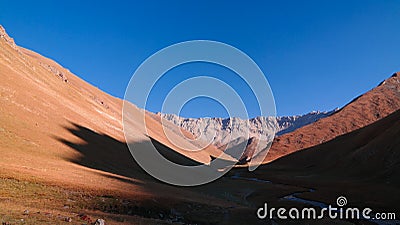 Sunset view to Tash-Rabat river and valley in Naryn province, Kyrgyzstan Stock Photo