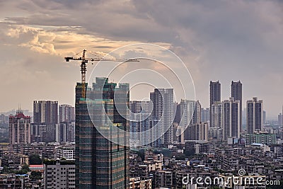 Sunset view of under construction building and many high-end enterprises such as finance, insurance, real estate, Guangzhou city, Stock Photo