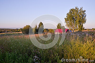 Sunset in the village. Nature in Russia. Road to field Stock Photo