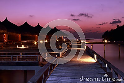 Sunset water villas Maldives Stock Photo