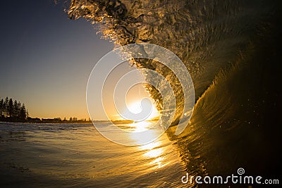 Sunset and the wave Stock Photo