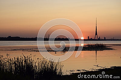 Sunset, Western Dvina river Davgava river, summer, evening. Natural landscape of the Baltics. Stock Photo