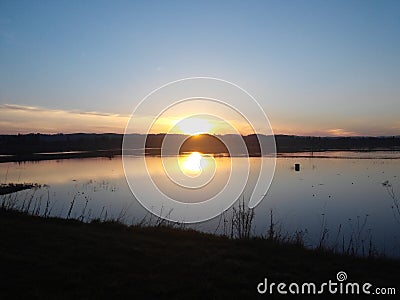 Sunsets on the lake Stock Photo