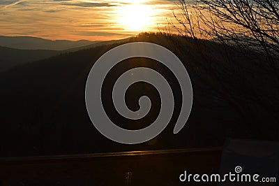 The Sunsetting over the mountain top Stock Photo