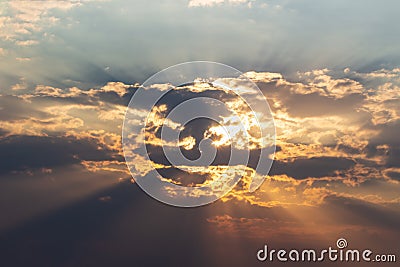 Sunshine hidden behind dark clouds Stock Photo