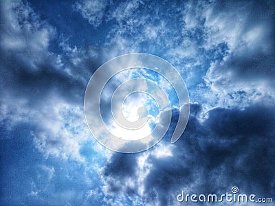 sunshine hidden by clouds Stock Photo