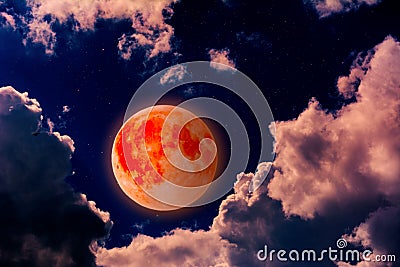 Super bloody moon in clouds Stock Photo